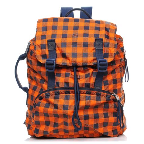 orange lv backpack.